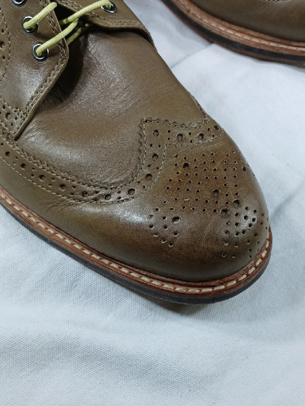Cole Haan Men’s Wingtip Derby Oxfords in Taupe